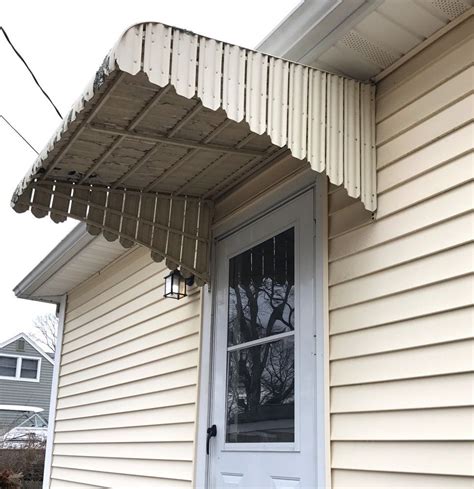 removing old metal awnings